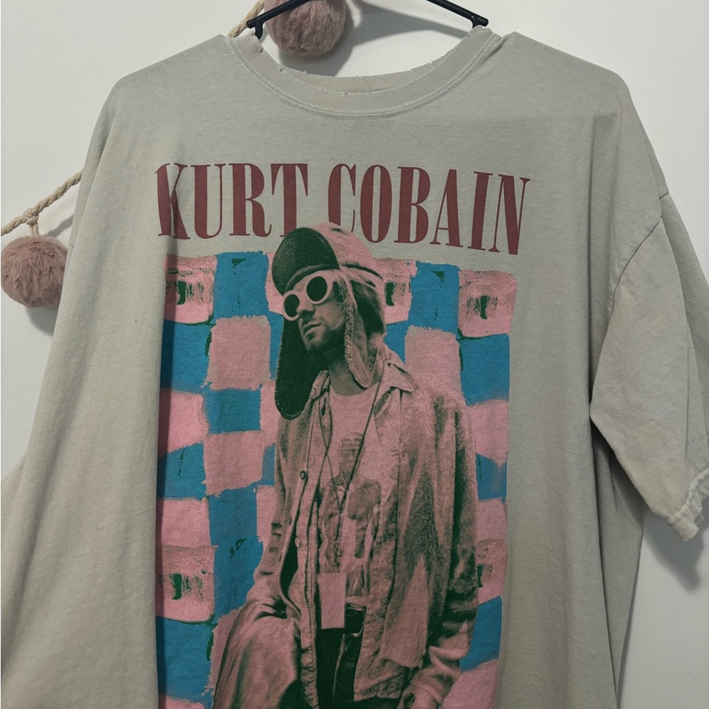 Kurt cobain shirt.